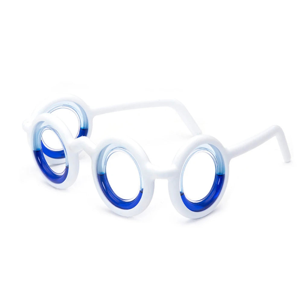 Side view of white motion sickness glasses resting on a flat white surface, showcasing their stylish frame design.